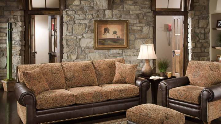 Brown Sofa Set in Resting Room And Stones Wall